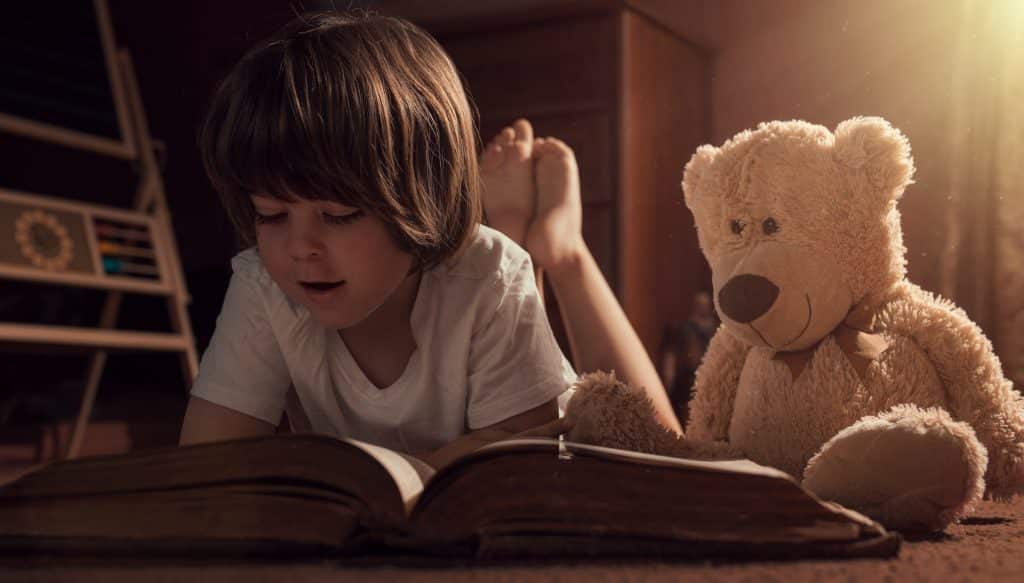 Boy reading as gallery image for book reviews.