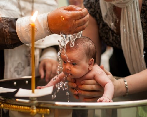 Infant being baptized