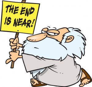 Cartoon figure with sign "The end is near"  Reference is to the end of the pandemic.