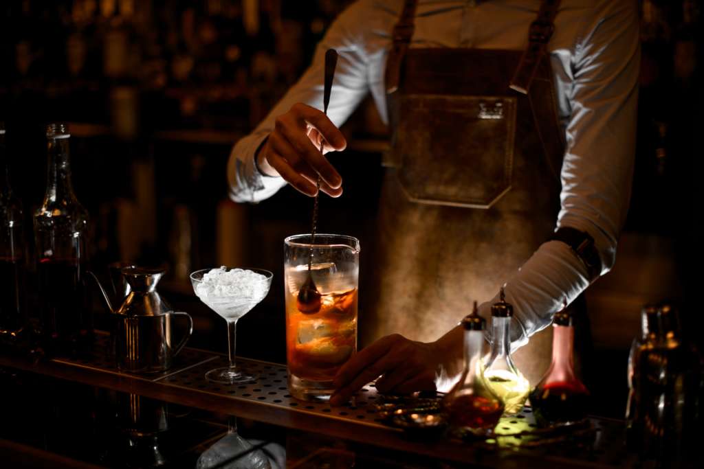 A speakeasy bartender