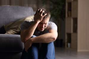 Young man grieving