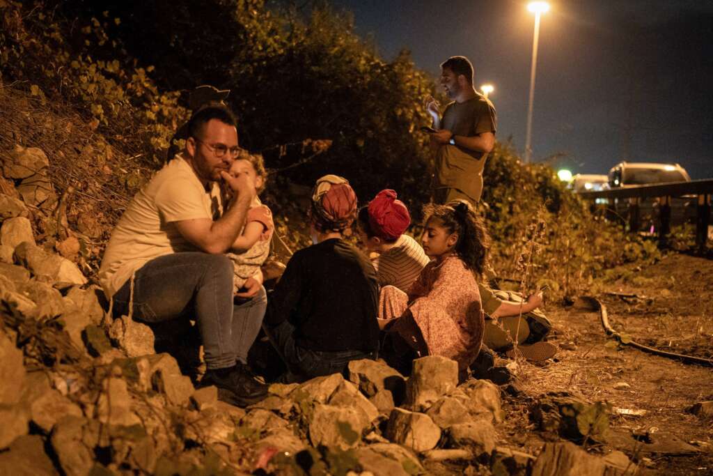 This is the End of the Third Temple.  Israeli's huddle at the side of the road during an Iranian missile attack.