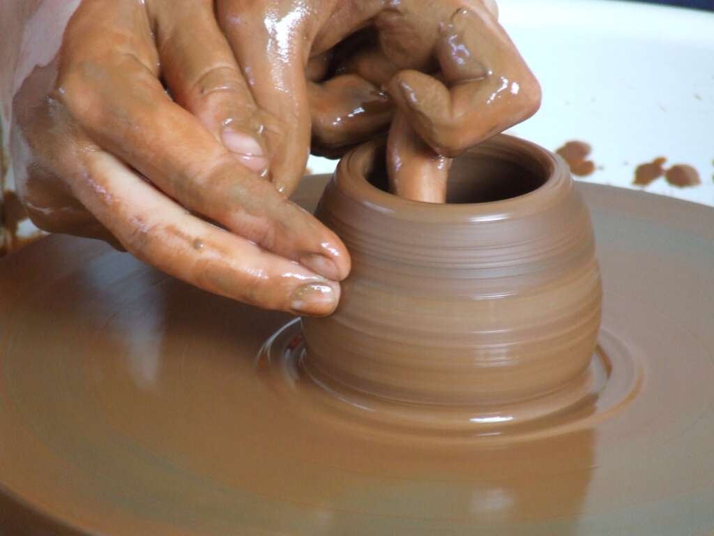 Dust in the Wind.  The potter molds the clay.